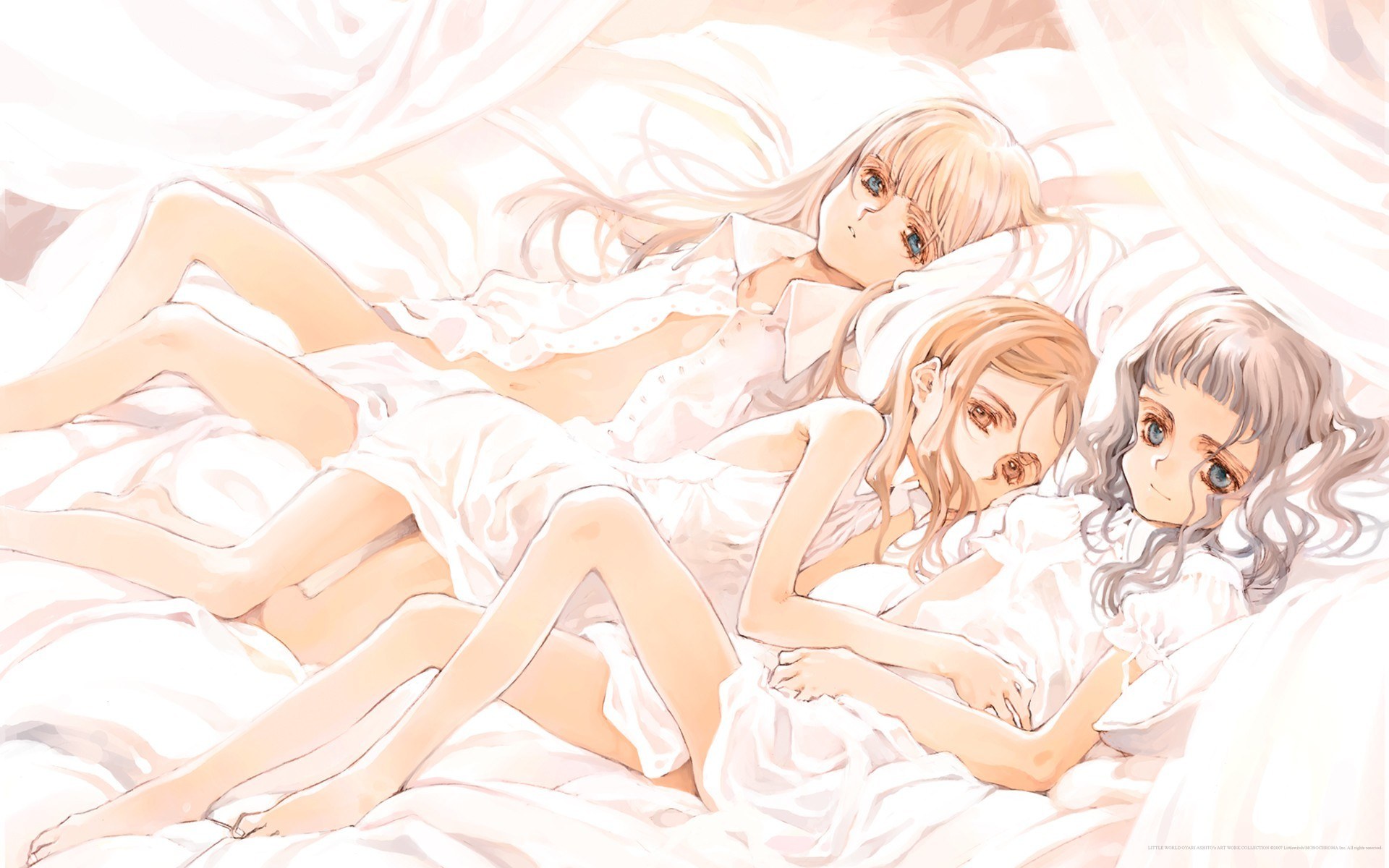 Three girls in white bed