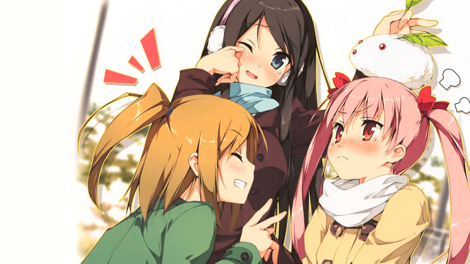 Three girls in winter clothes