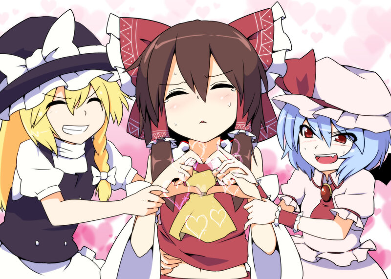 Three girls making a heart shape