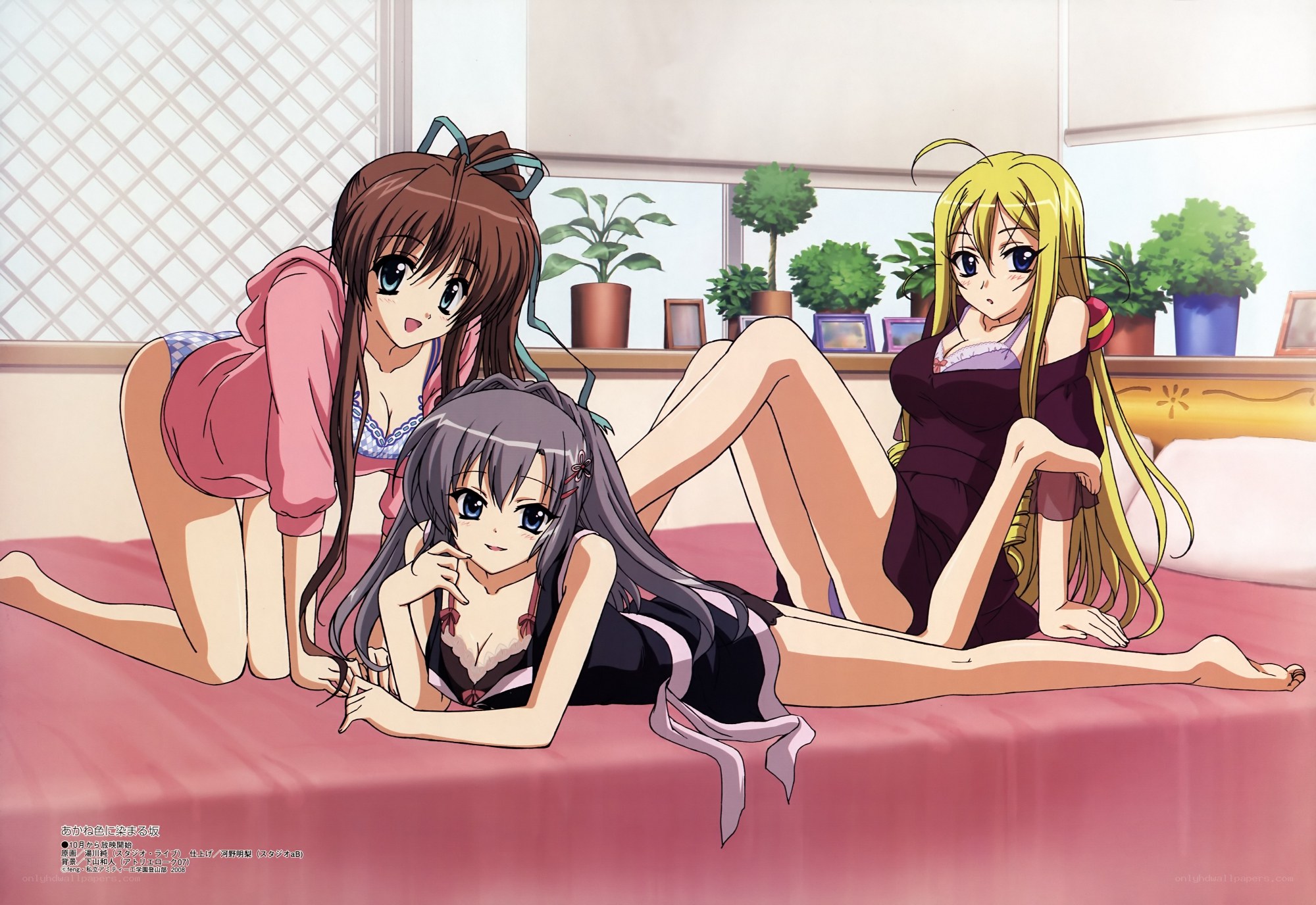 Three girls on a bed
