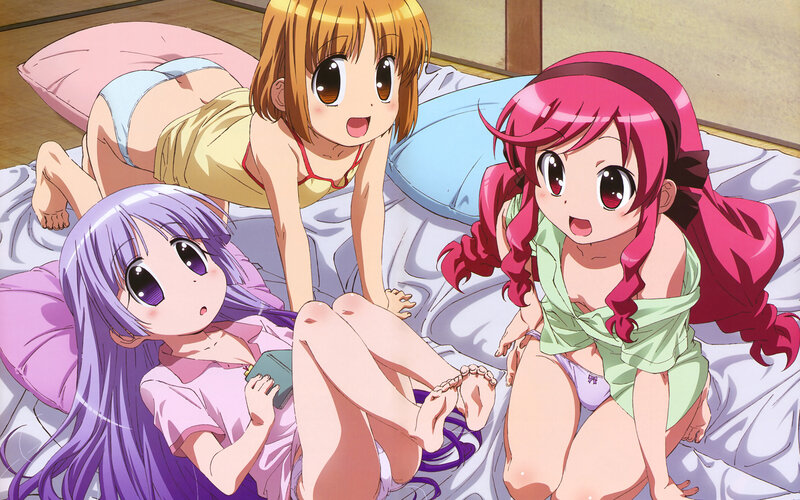 Three girls on a bed