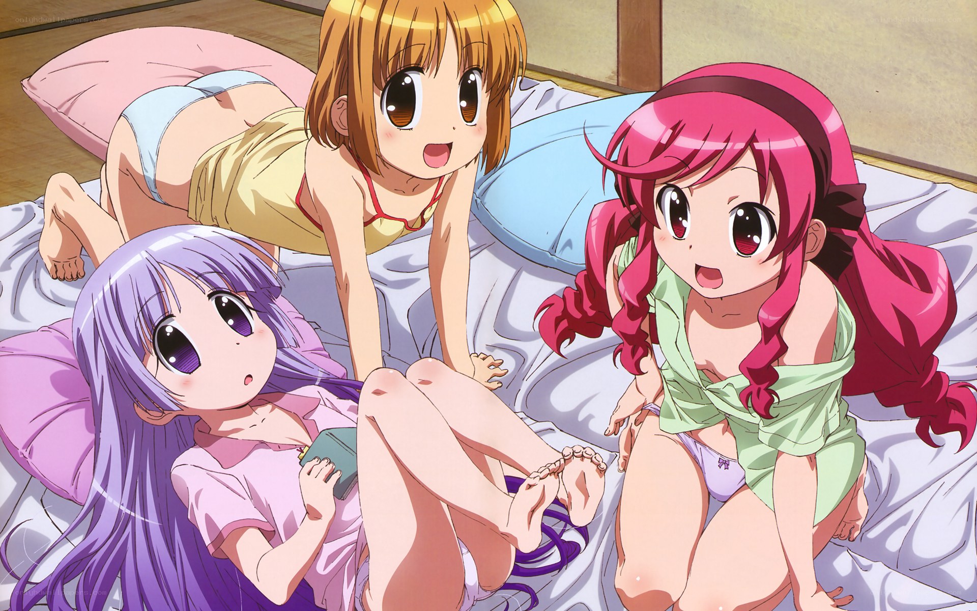 Three girls on a bed