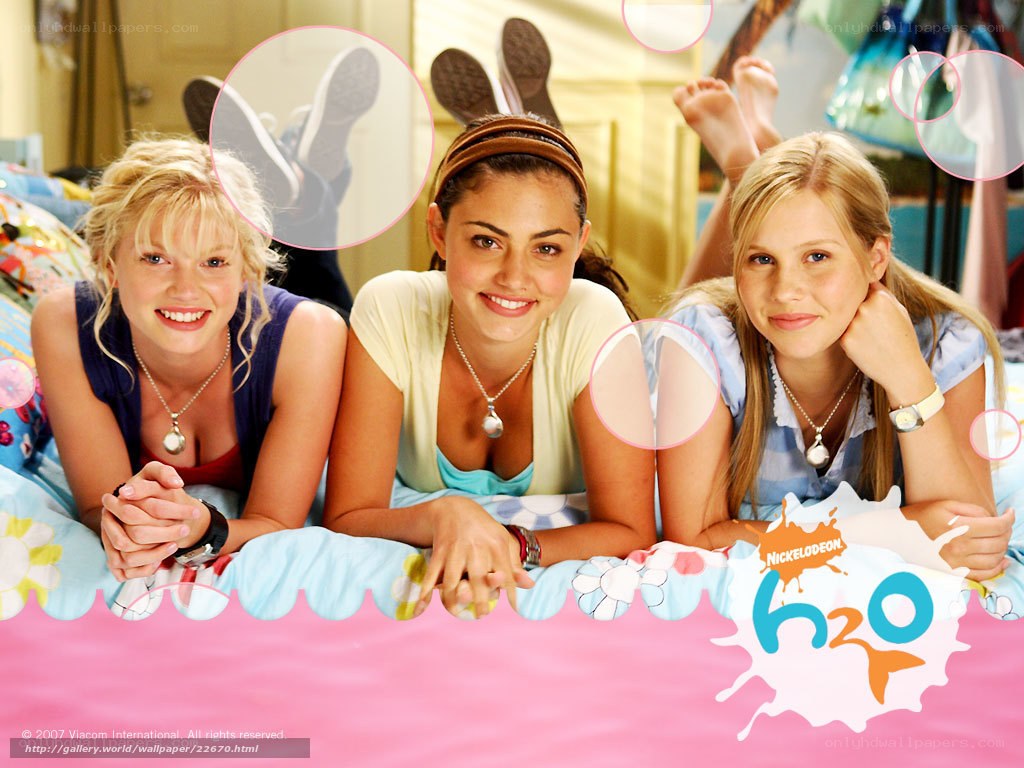 Three girls on a bed