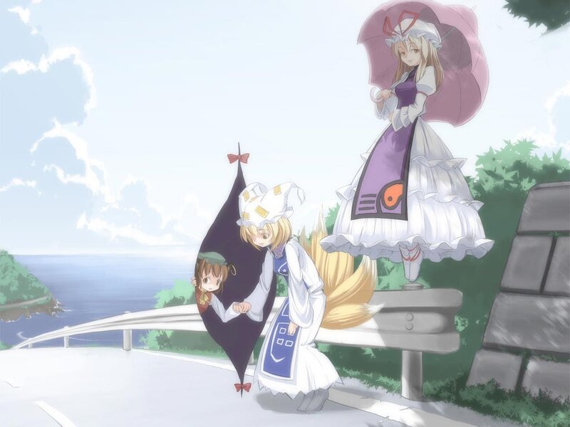 Three girls on a coastal road
