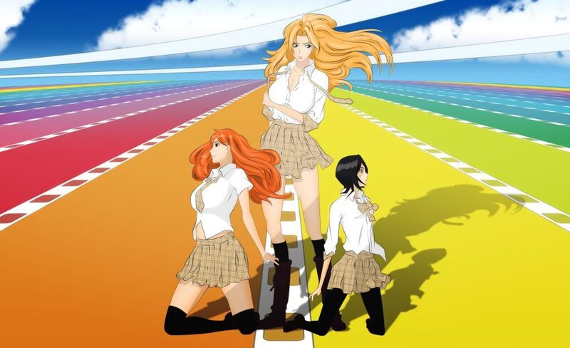 three girls on a colorful track