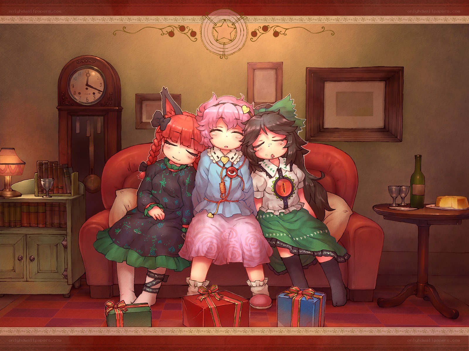 Three girls on a couch with gifts