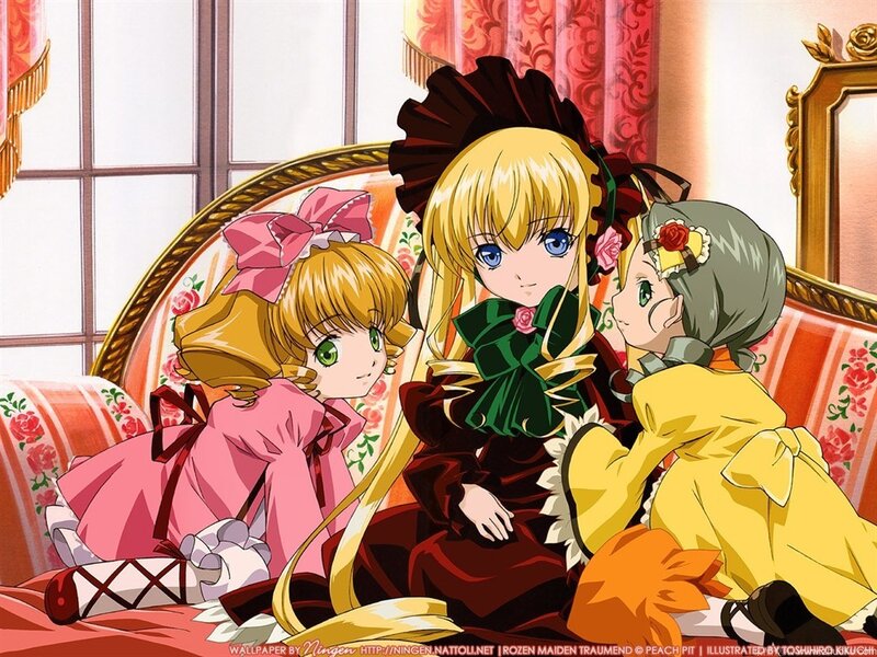 Three girls on a floral couch