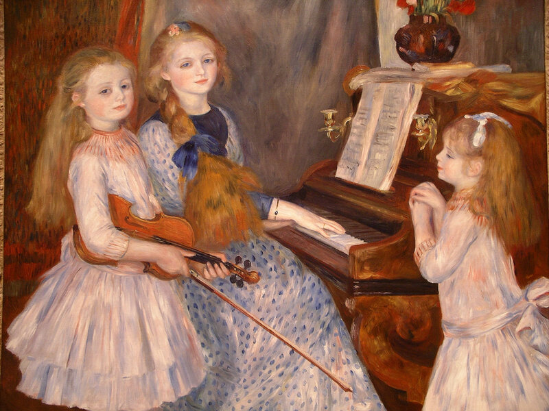 Three girls playing music