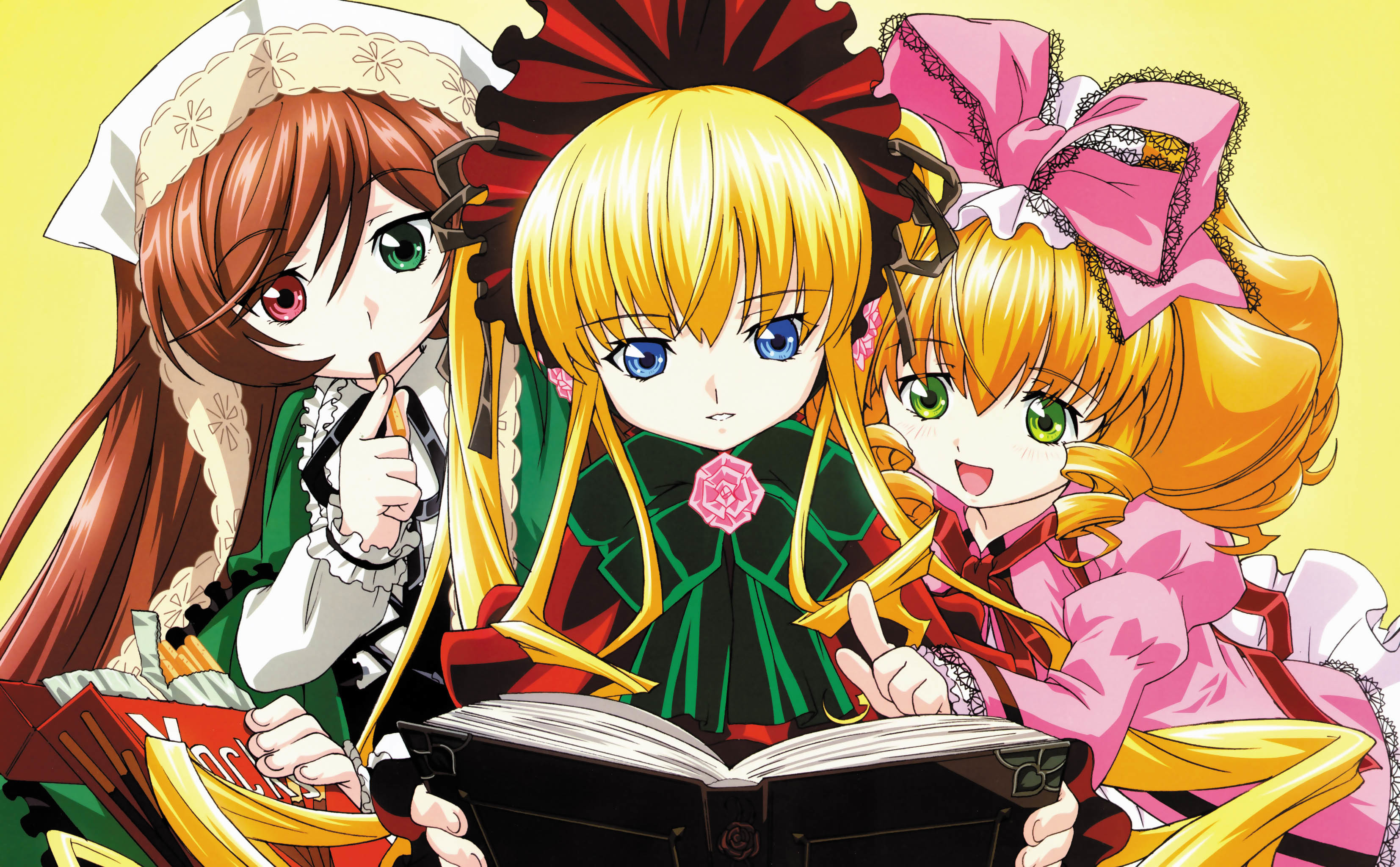 three girls reading a book