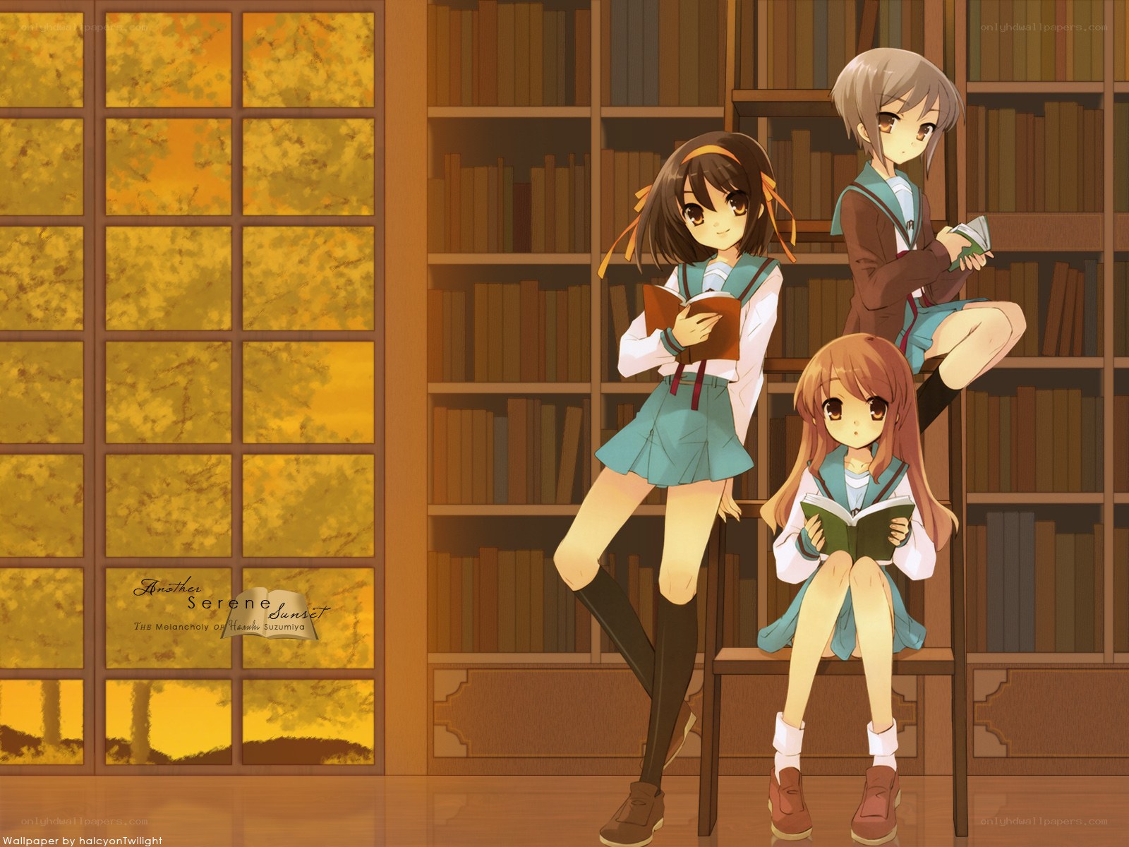 Three girls reading in a library