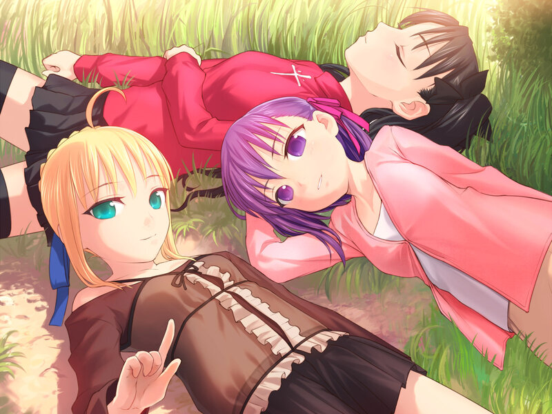 Three girls relaxing in the grass