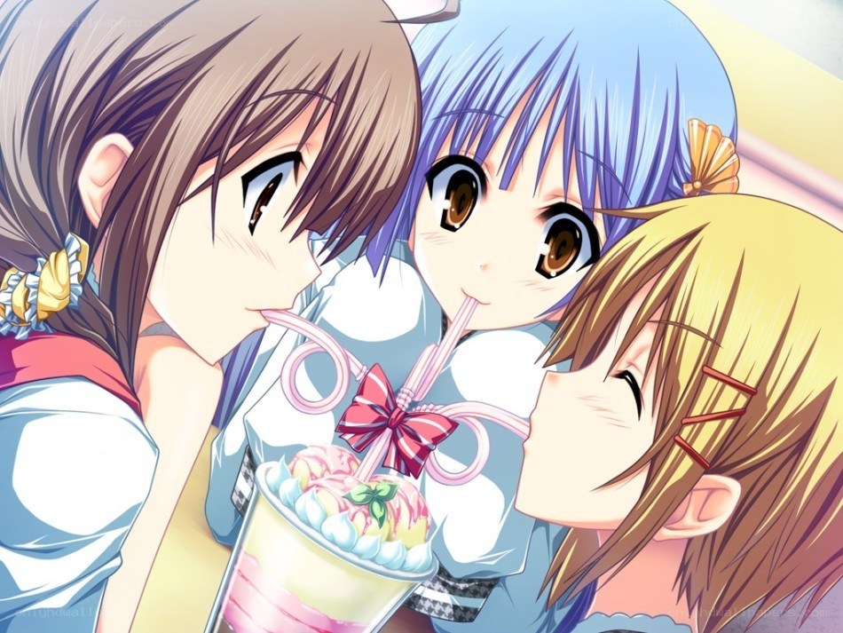 three girls sharing a drink