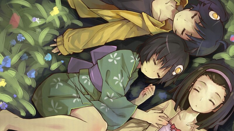 Three girls sleeping in a field