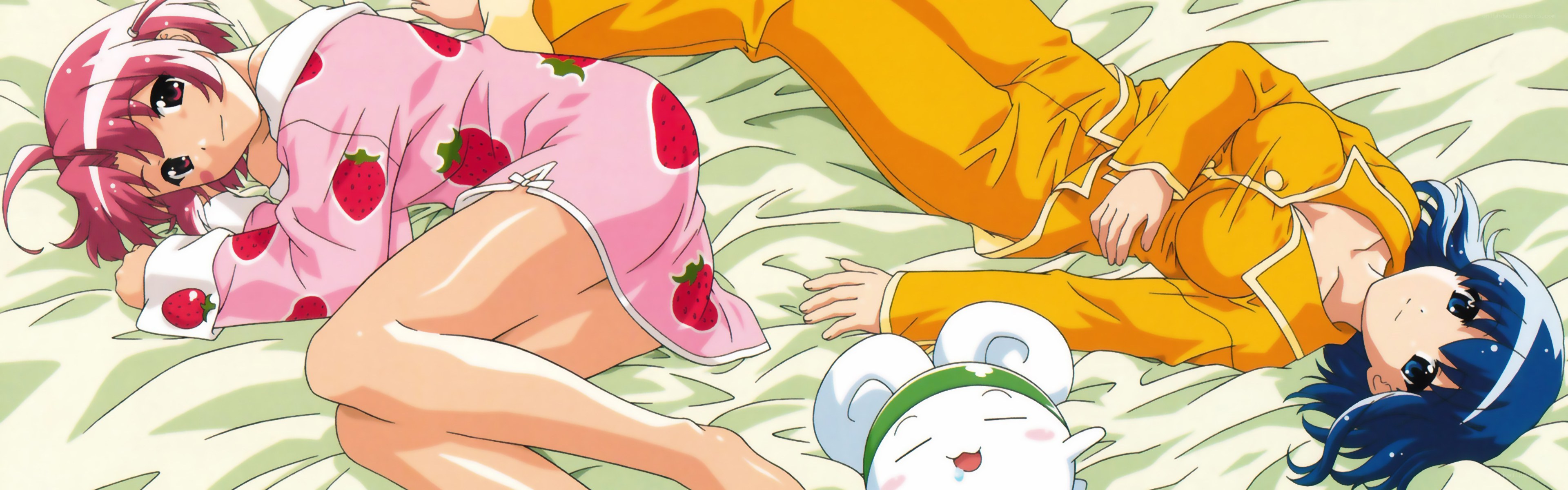Three girls sleeping on a bed