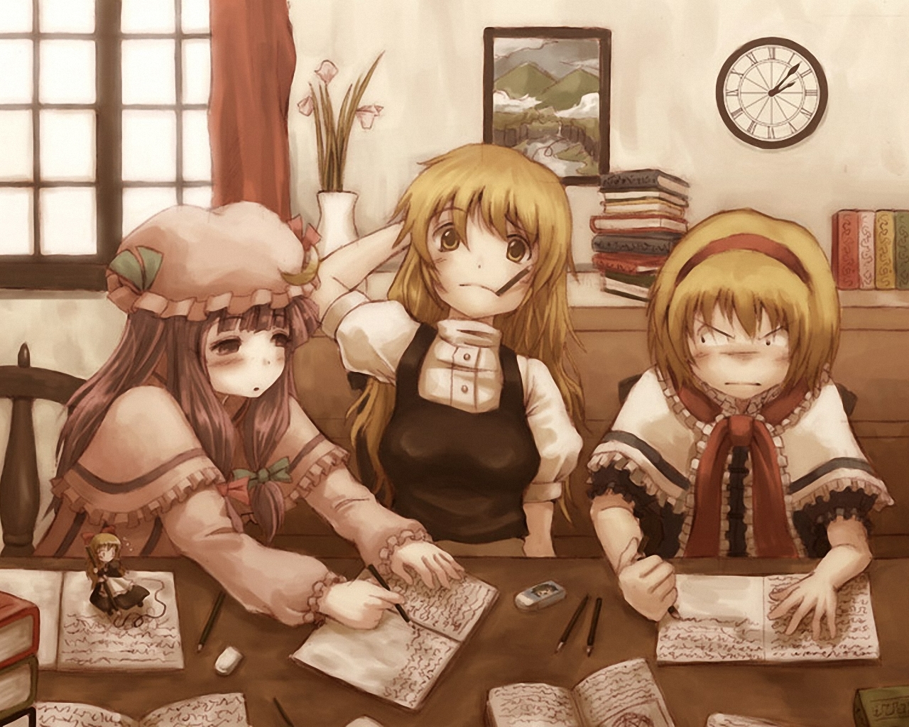 Three girls studying at a table