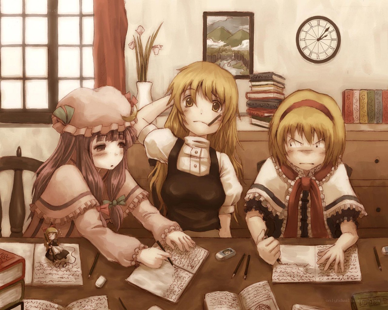 three girls studying at a table