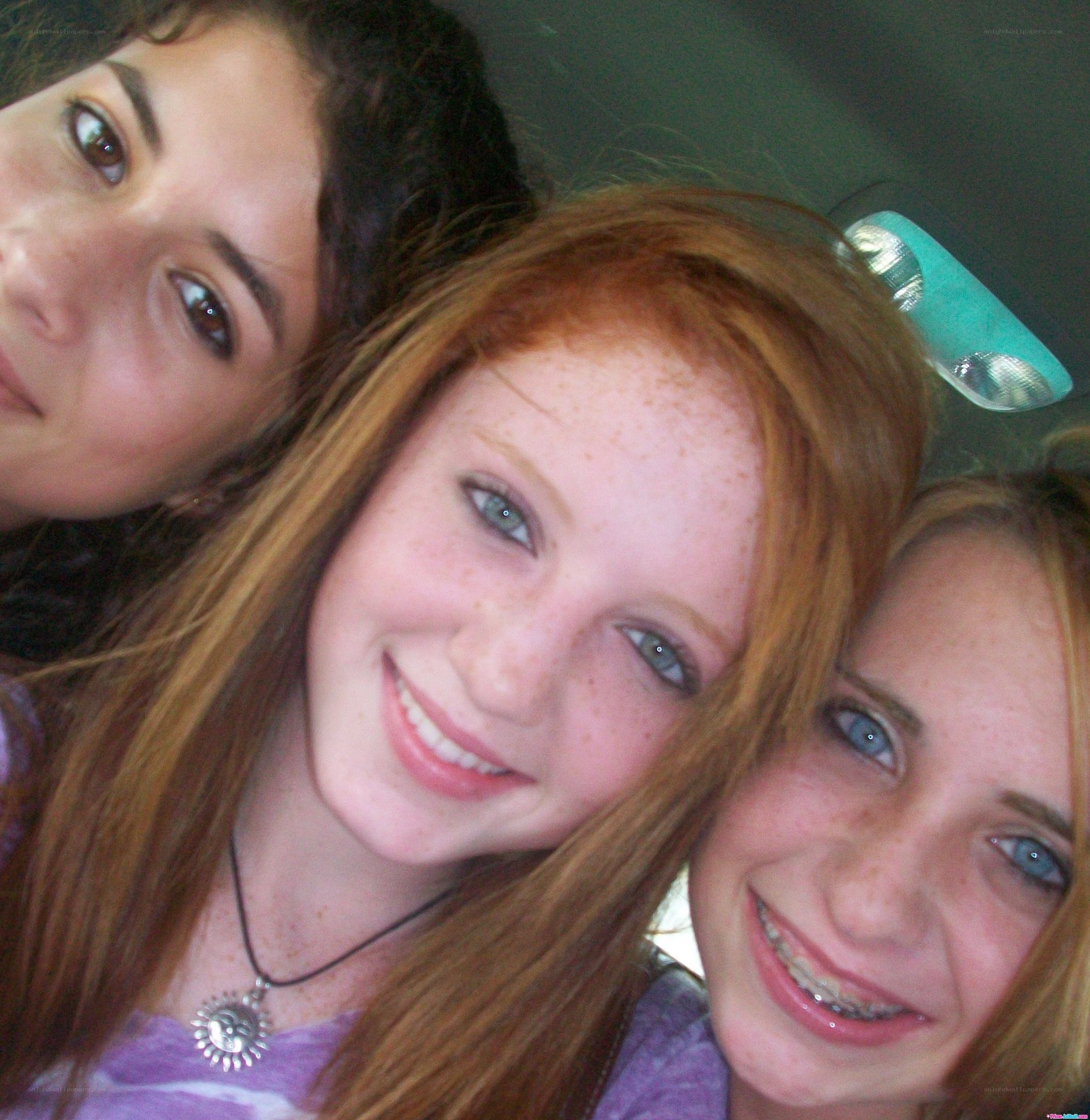 three girls taking a selfie
