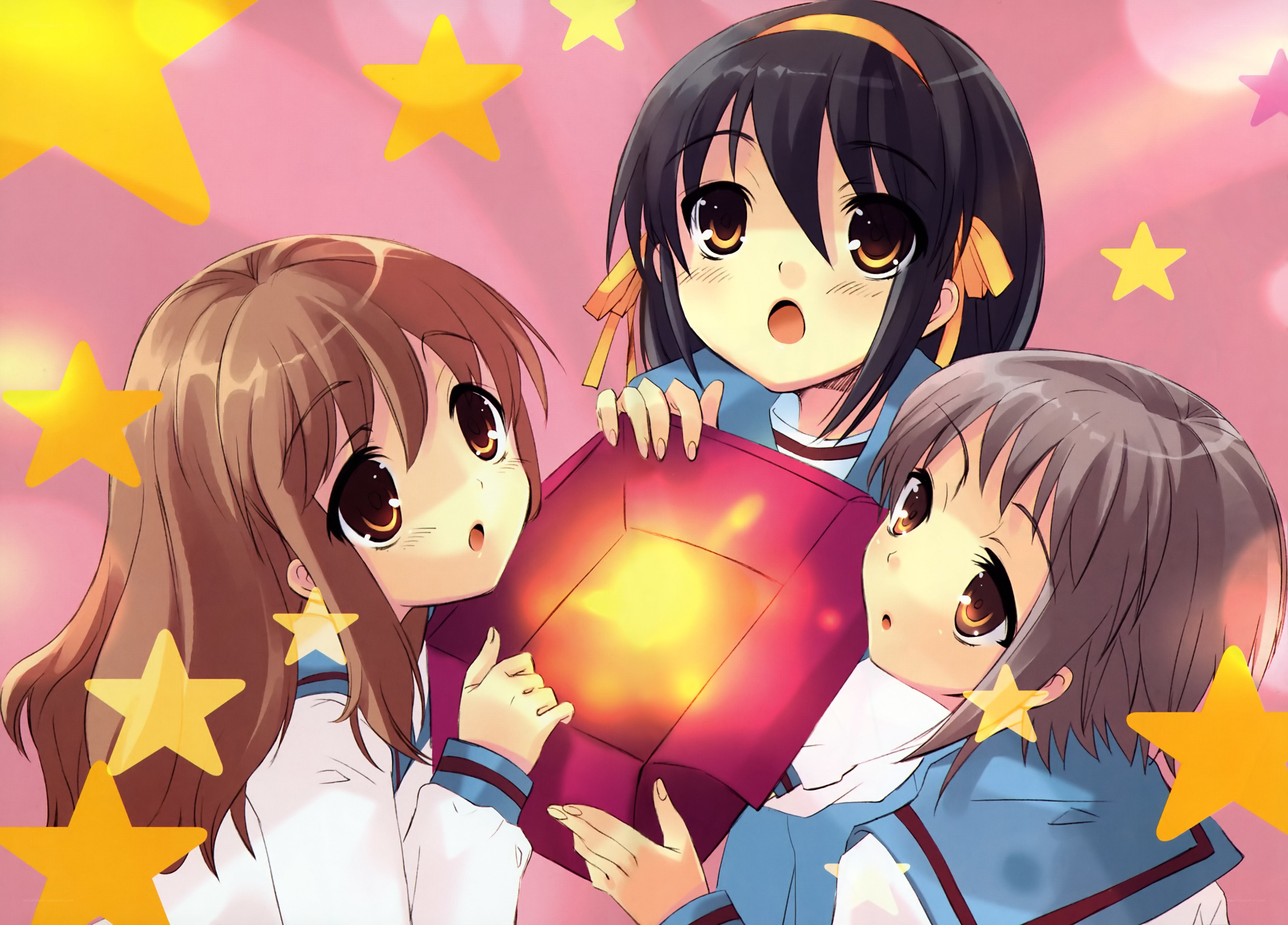 Three girls with a glowing box