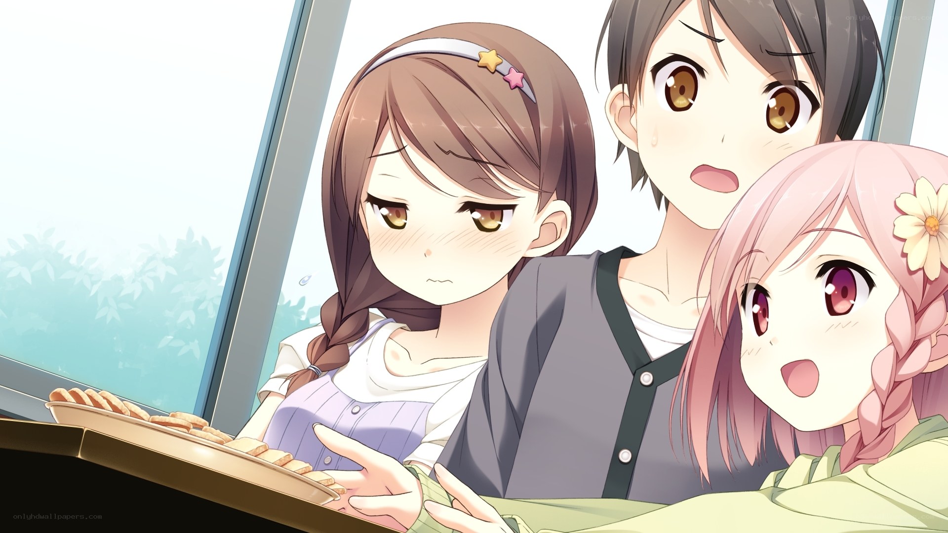 Three girls with cookies