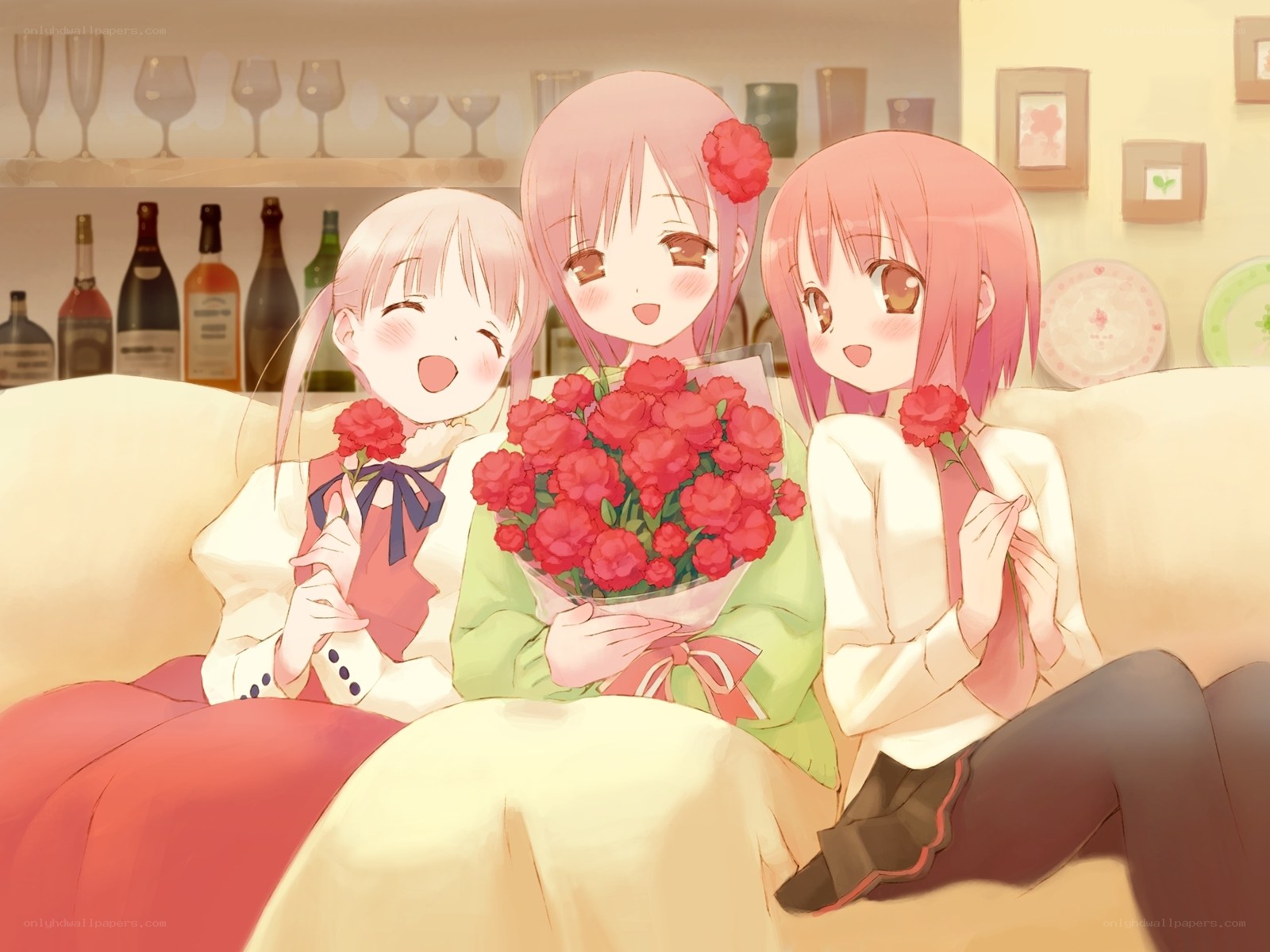 Three girls with flowers