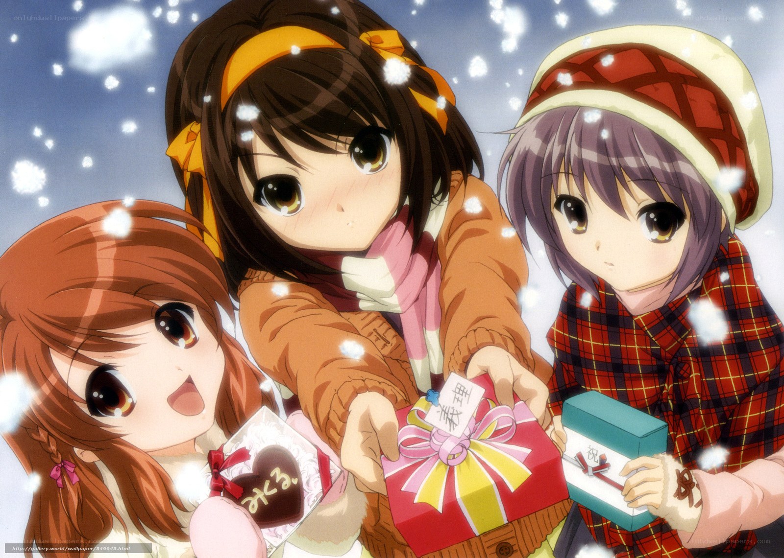 Three girls with gifts in snow