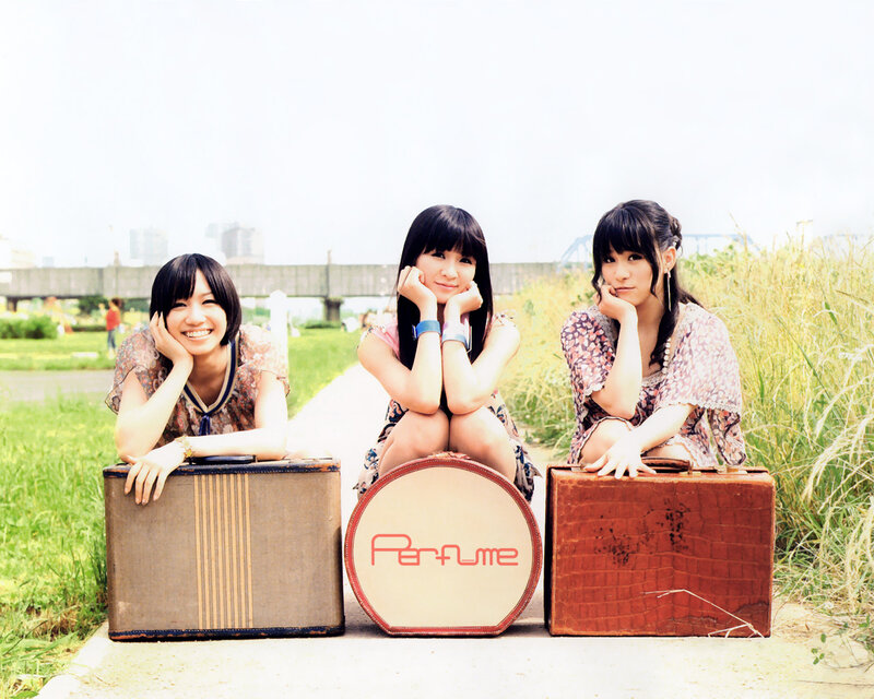Three girls with suitcases
