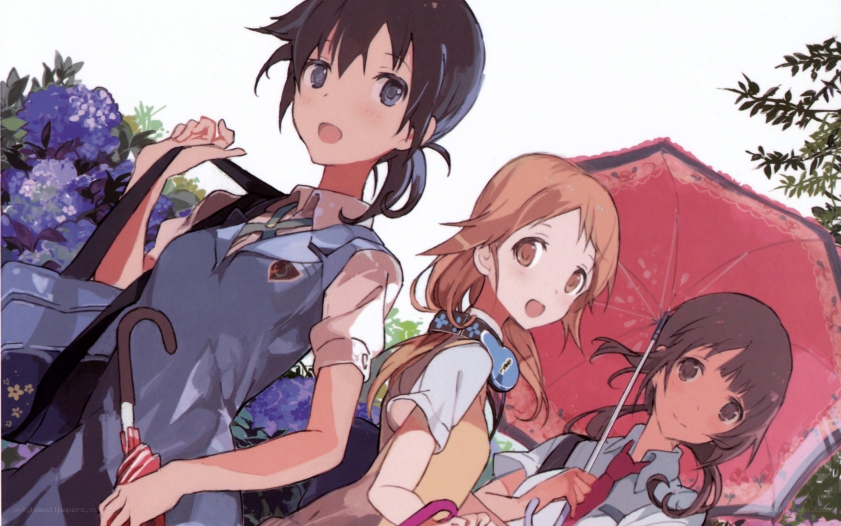 Three girls with umbrellas