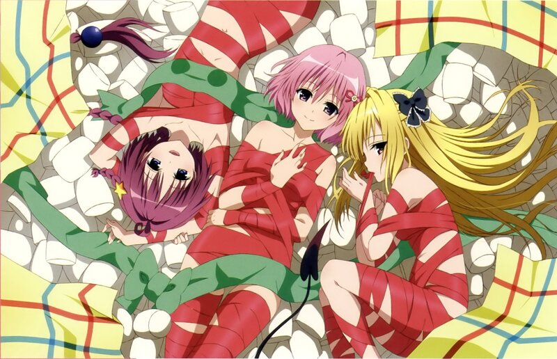 Three girls wrapped in ribbons