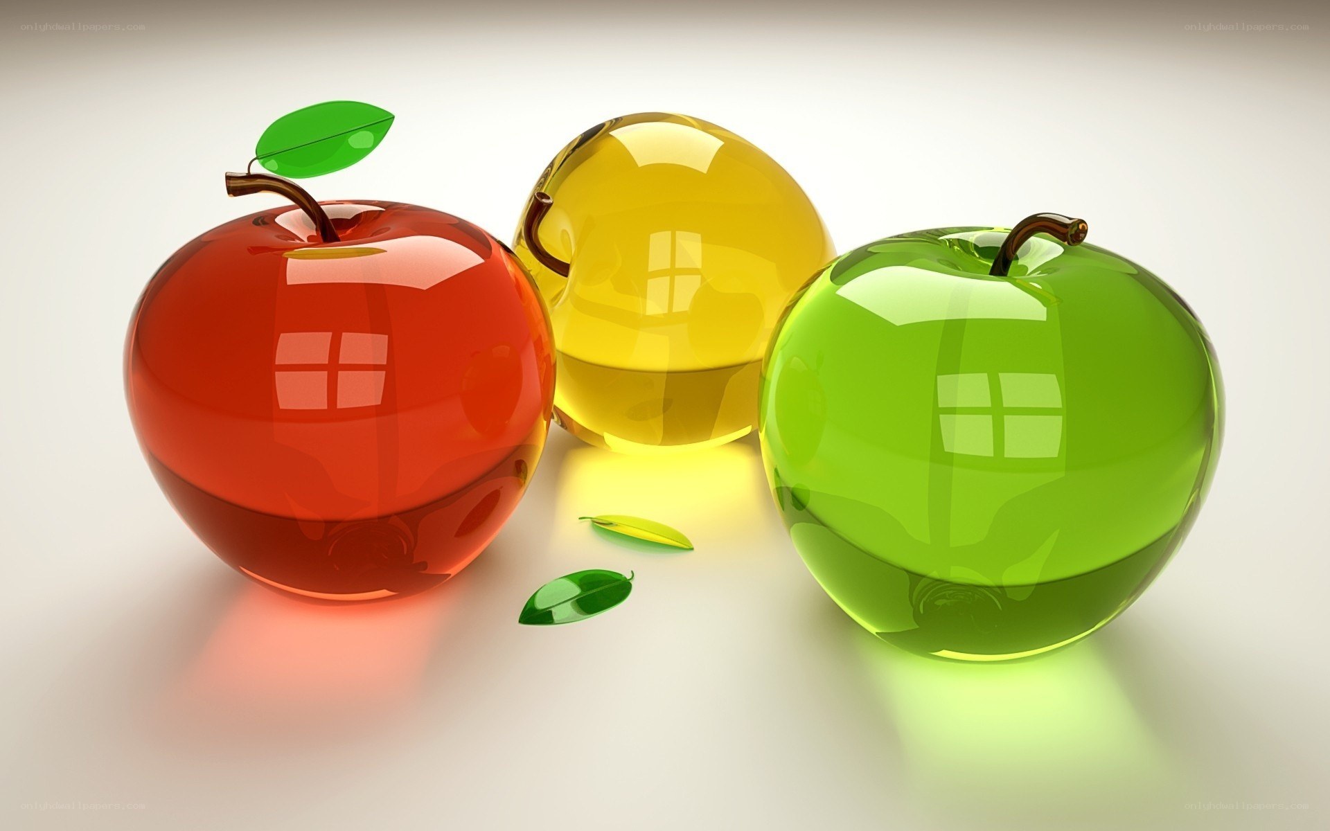 Three glass apples