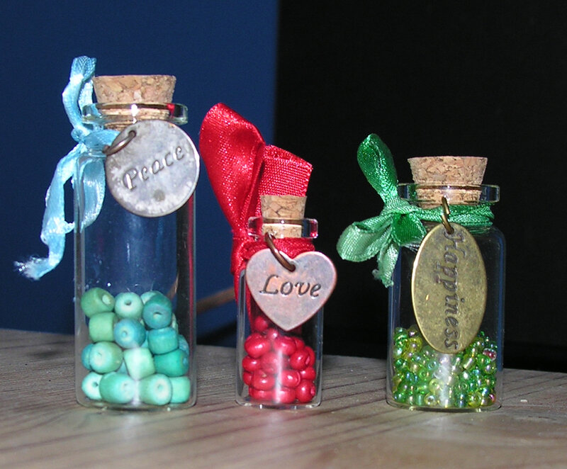 Three Glass Bottles with Beads