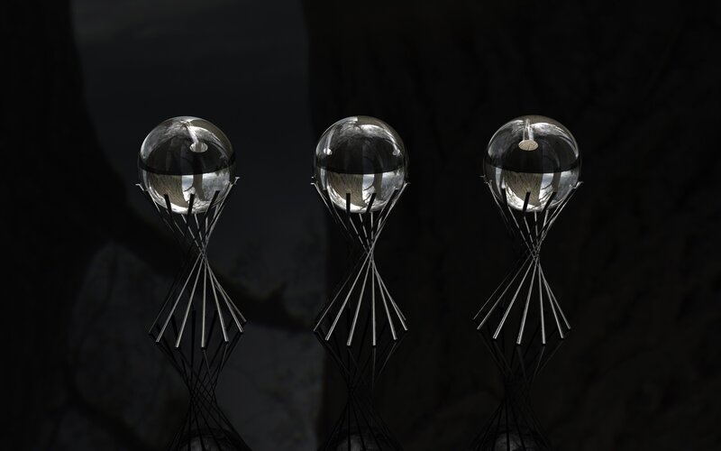Three glass orbs on metal stands