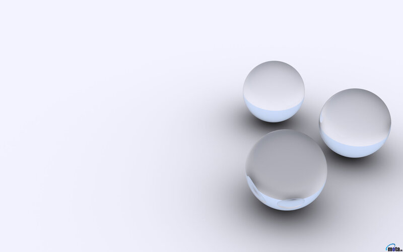 three glass spheres on white