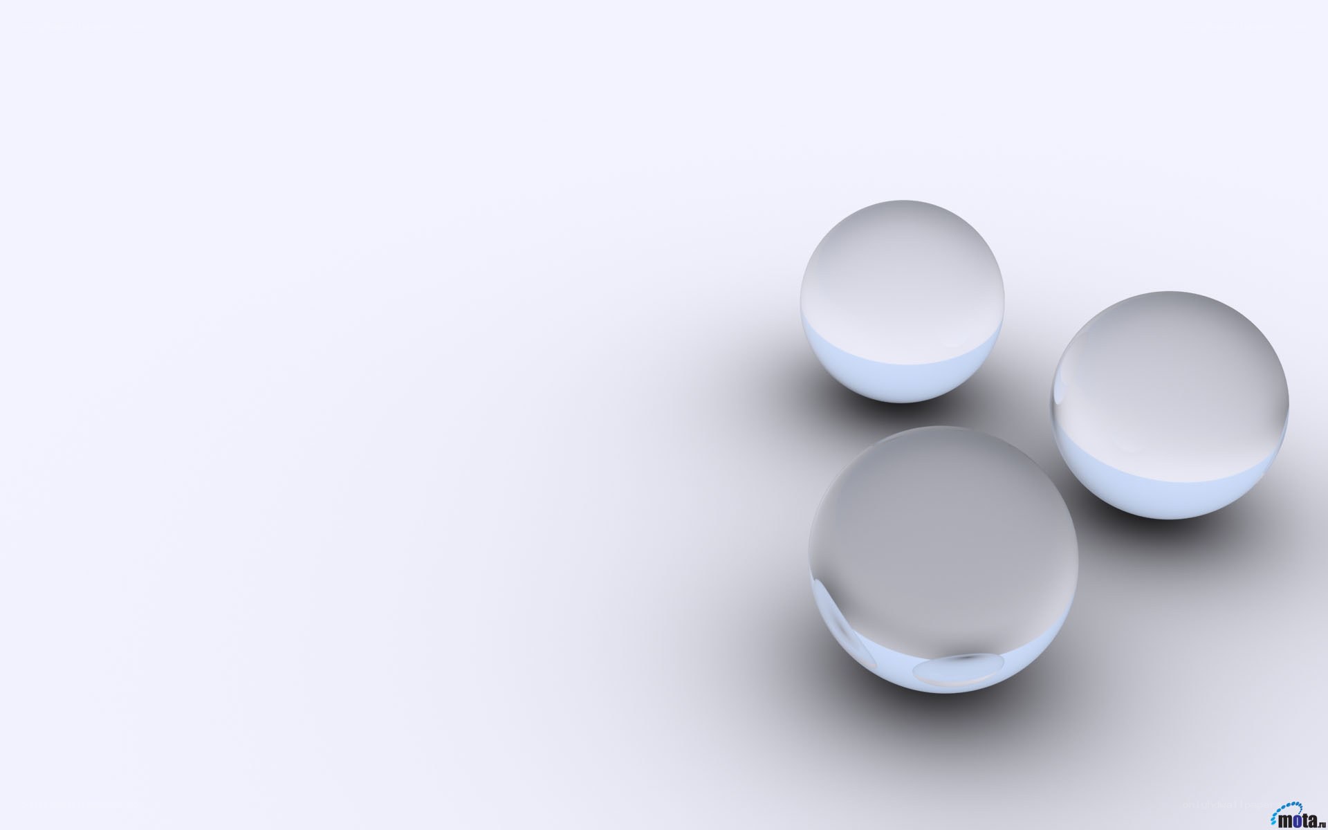 three glass spheres on white