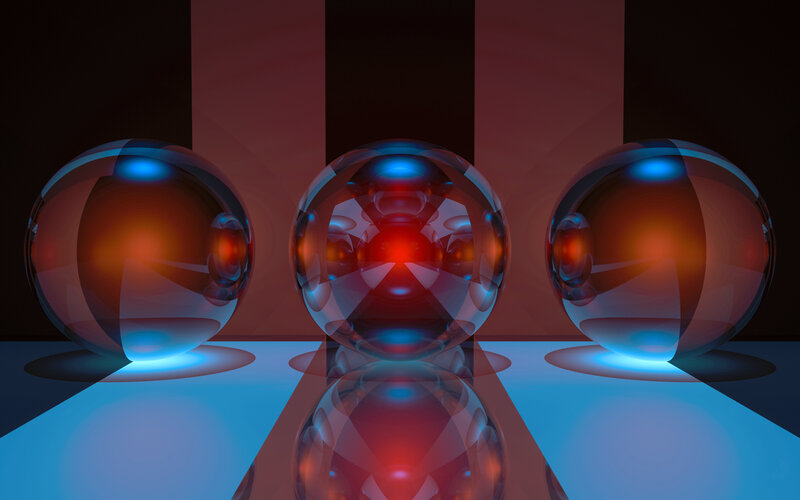 Three glass spheres with reflections