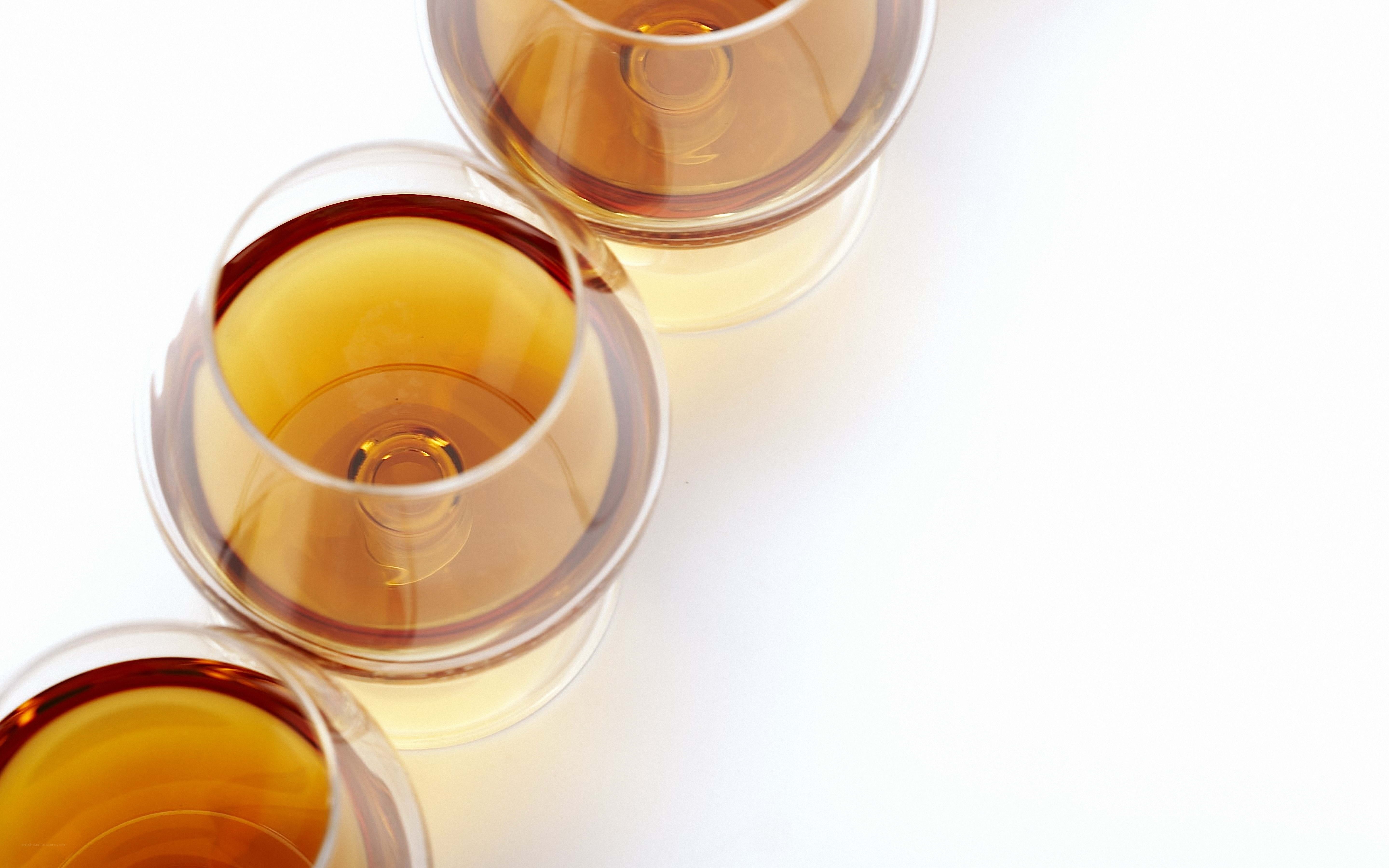 Three glasses of white wine