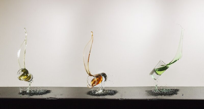 Three Glasses Spilling Liquid