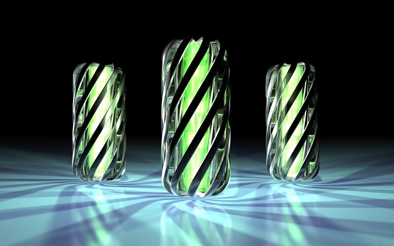 Three glowing green cylinders