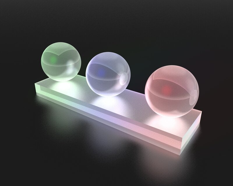 Three glowing spheres on a platform