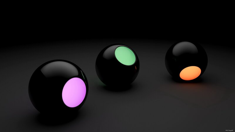 Three glowing spheres on dark surface