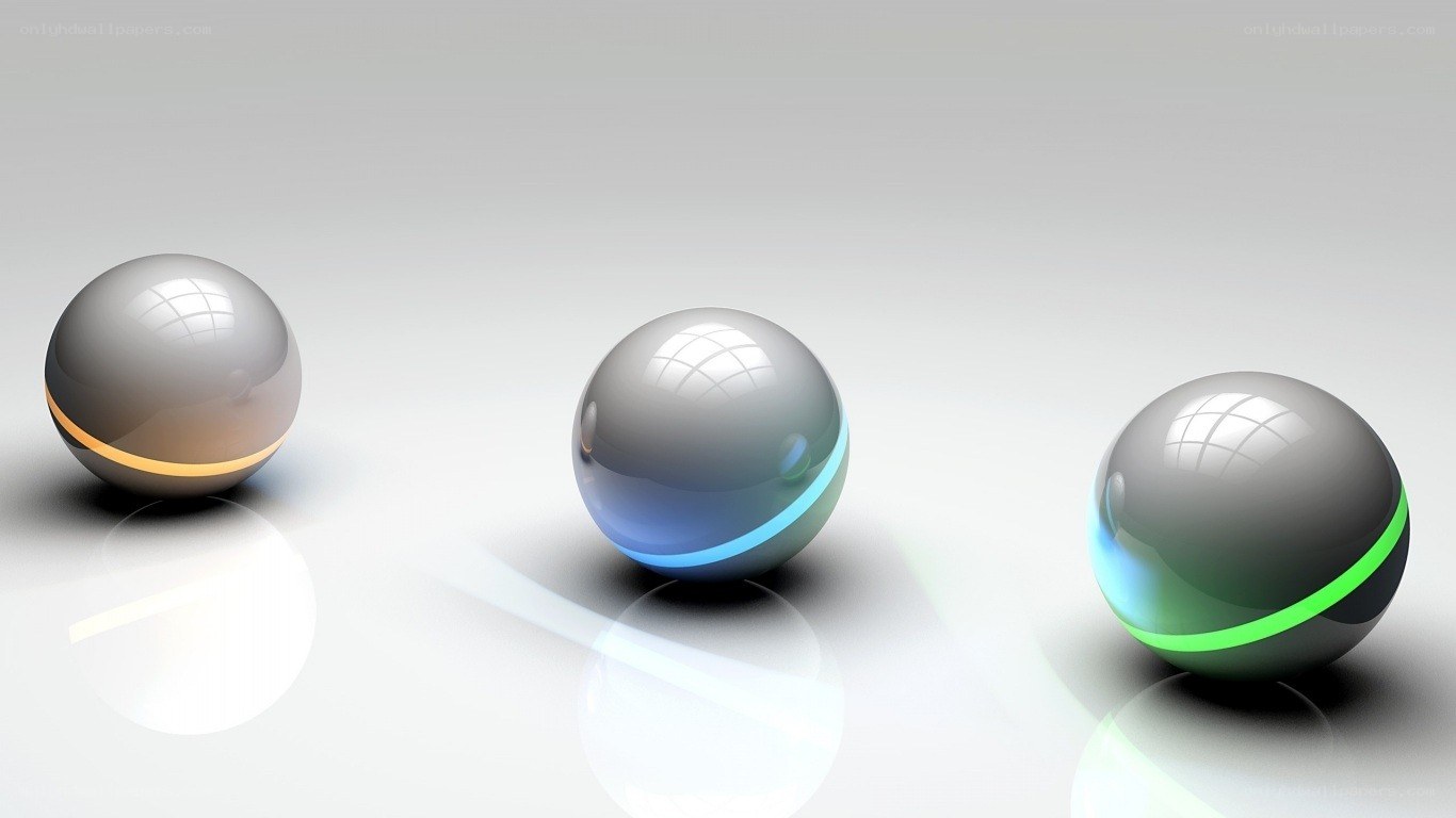 Three glowing spheres on white