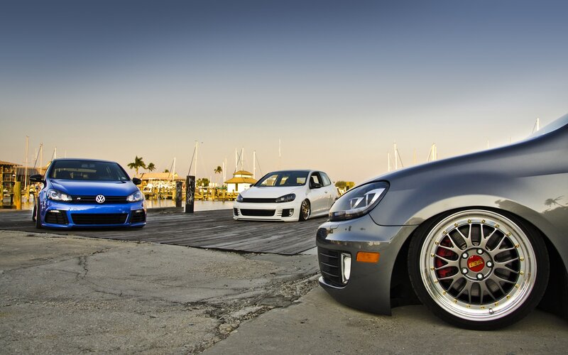 Three Golf cars at a marina