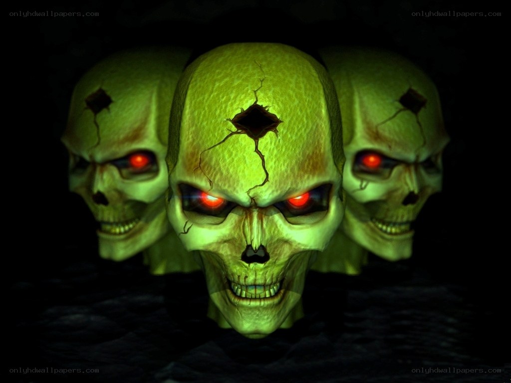 three green skulls with red eyes