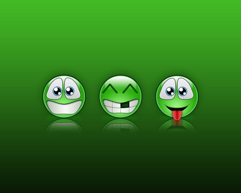 three green smiley faces