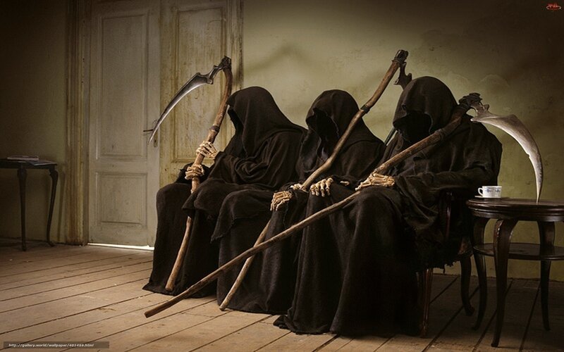 Three grim reapers sitting