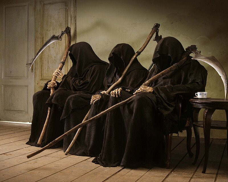 Three grim reapers waiting