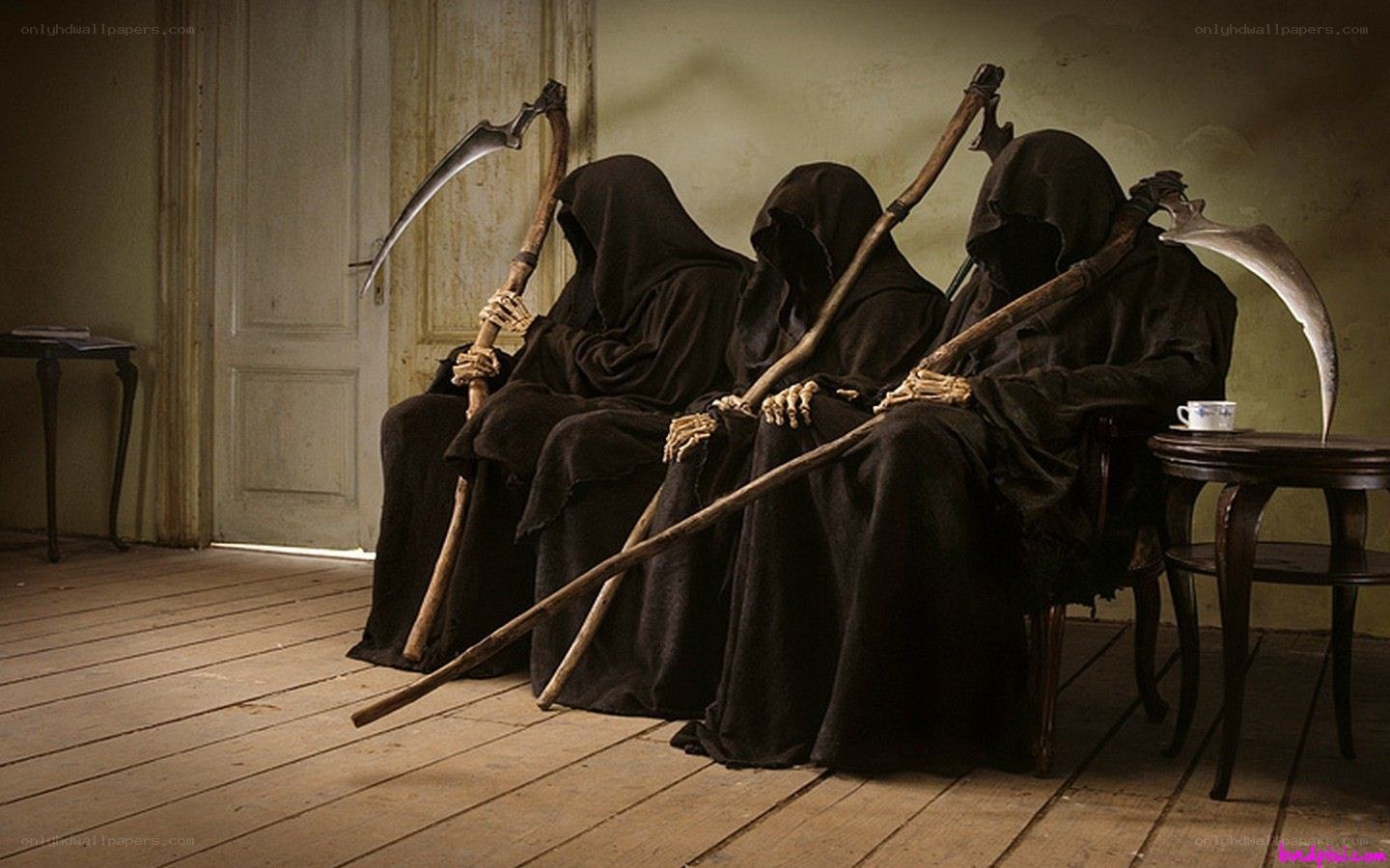 Three grim reapers waiting