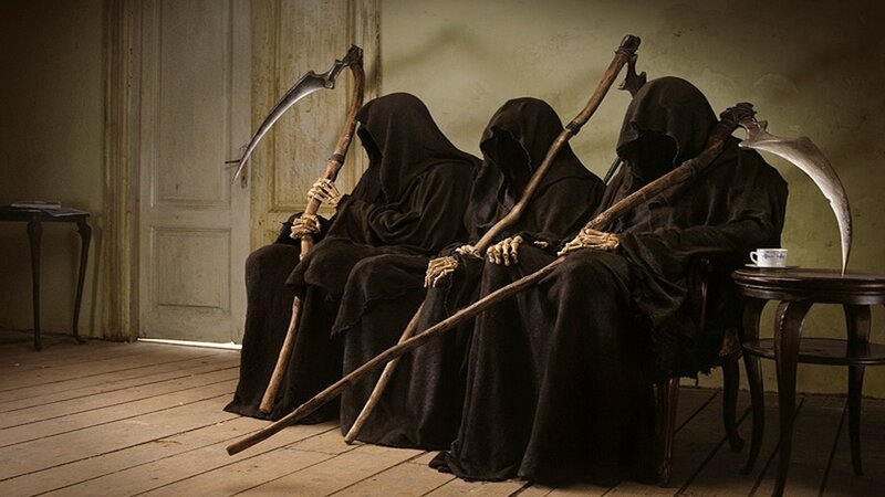 Three grim reapers waiting