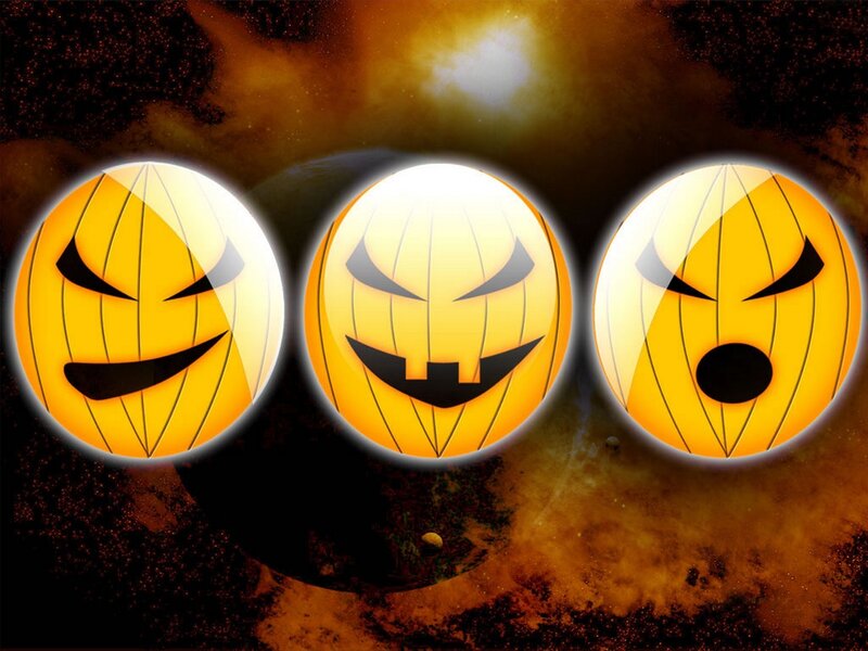 Three Halloween pumpkins in space