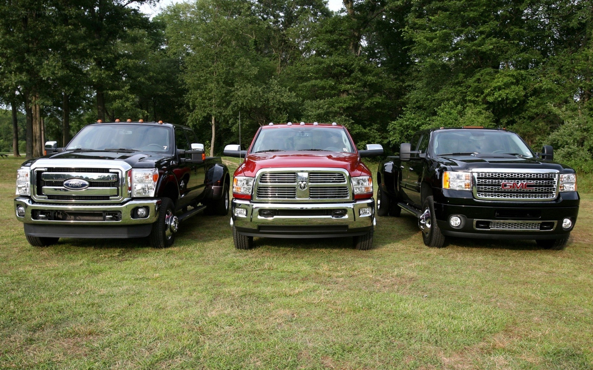 Three heavy-duty pickup trucks