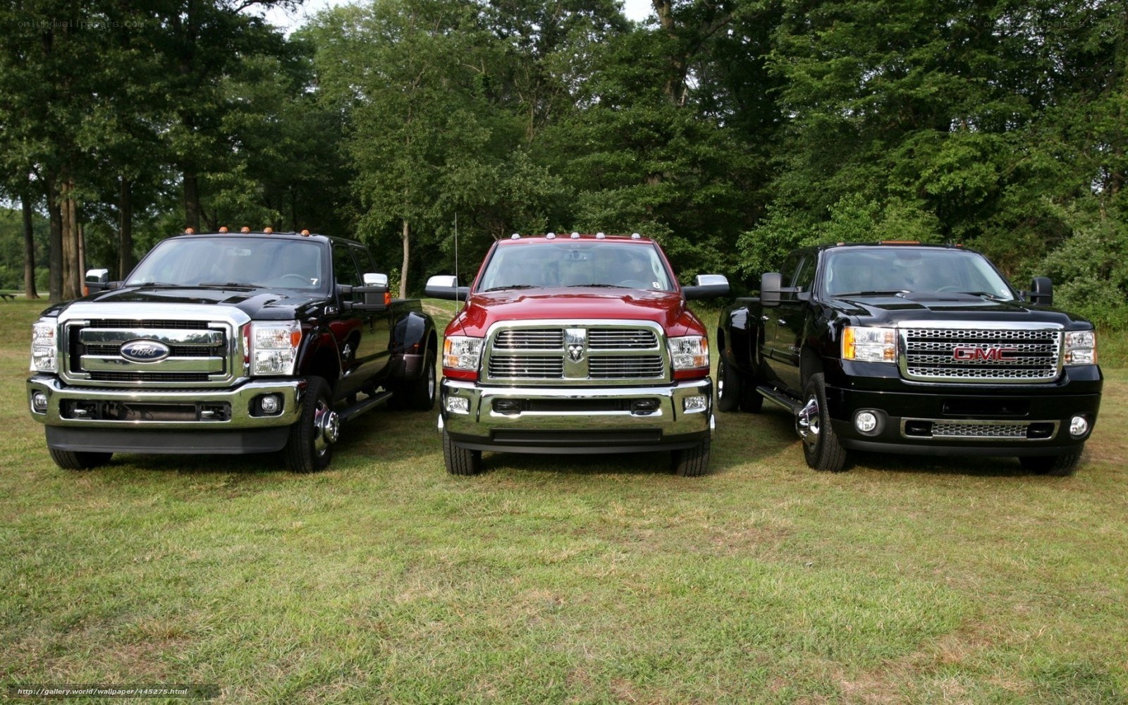 Three heavy-duty pickup trucks